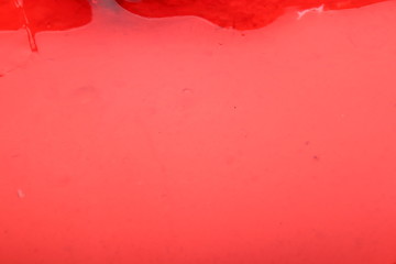 Red jelly on a cake close-up