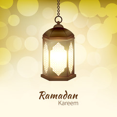 Ramadan Kareem - greeting card with hanging islamic lantern on golden bokeh background for Muslim Community festival. Bright lamp. Graphic design element for invitation, flyer. Vector illustration.