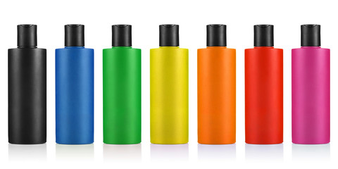 Set of black, blue, green, yellow, orange, red and pink plastic bottles, isolated on white background