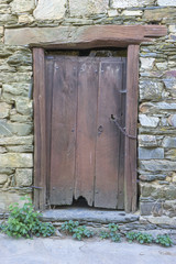 Grunge door, wood and stone houses in the province of Zamora in Spain