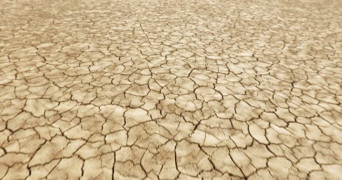 closeup steadycam shot of cracked ground in dried lake. ecological disaster, apocalypse concept 4k
