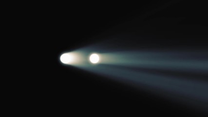 Animation of car headlight on black background. Luminous headlights of automobile contrast with black background. Concept of car presentation. Moving car with lights at night. Stylish and abstract