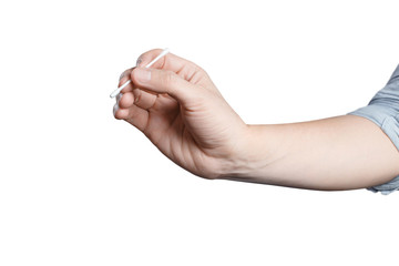 Hand holding a cotton swab on white background
