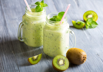 kiwi smoothies fresh vitamin cocktail wooden background
