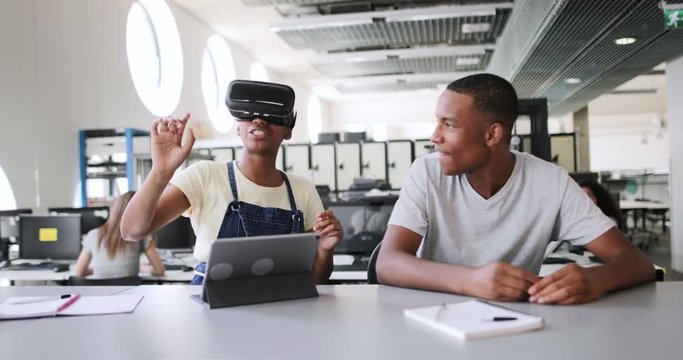 High school students using VR headset in class
