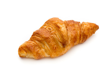 Tasty buttery croissants on the white background.