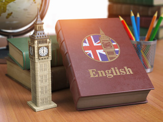 Studying and learn English concept. Book with flag of Great Britain and Big Ben tower on the table. - obrazy, fototapety, plakaty