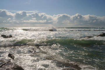 Ocean daytime landscape, giving strength. The space is filled with water, spray and ocean noise