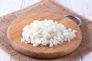 Sliced onion on a chopping board
