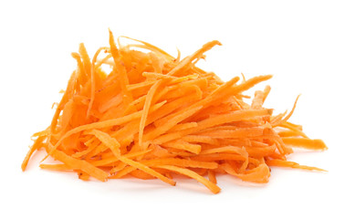 Grated ripe carrot on white background