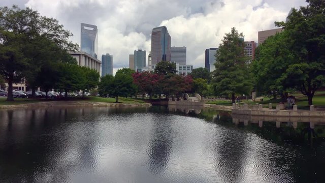Charlotte NC skyline as seen from Marshall Park on a cloudy summer day