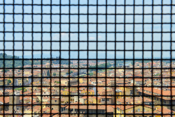 Beautiful view of Florence through grid from Palazzo Vecchio in Florence, Italy