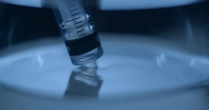 Water and syringe slow motion