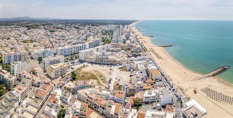 Panorama of Quarteira resort by Atlantic Ocean, Algarve, Portugal
