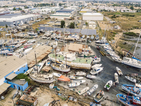 Aerial view of sewage treatment plant and shipyard in Olhao, Algarve, Portugal
