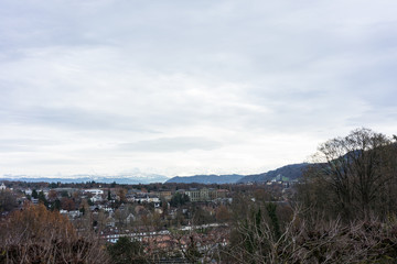 Fototapeta na wymiar city of bern with snow mountain alps in background