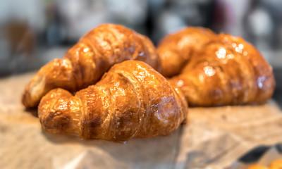sweet pastry croissant exposed in a store, bakery Croissant for an appetizing breakfast