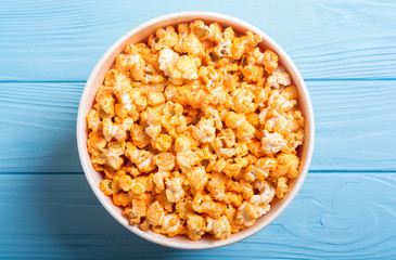 Yellow cheese popcorn in bowl