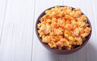 Yellow cheese popcorn in bowl