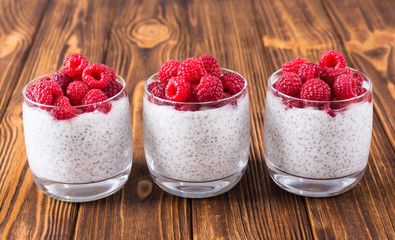 Chia pudding in glass with raspberry