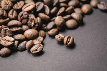 Close up of coffee beans are the background.