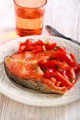 Red fish steak, grilled and salad