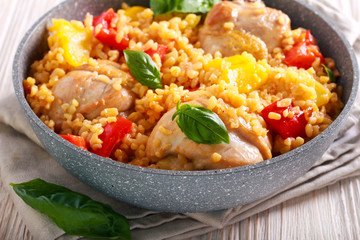 Chicken drumsticks with bulgur