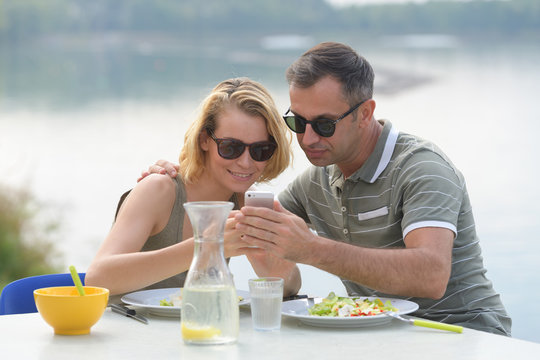 couple on holiday eating breakfast