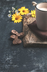 Cup of coffee and chocolate cookies on the white background. Rustic style