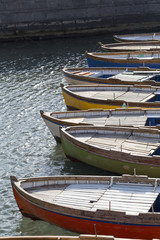 Fototapeta na wymiar Row of boats anchored in the Bay of Naples, Campania, Italy