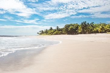 Beautiful paradise white sand beach of Playa Carmen, near Santa Teresa on the Nicoya peninsula of Costa Rica