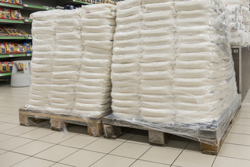 Obraz na płótnie Canvas Sacks of flour in the supermarket. Warehouse with provisions.
