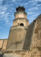 City wall tower fort with blue sky at Pingyao Ancient City, China