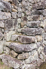 Historical stone stairs. Stepped structure made of stone blocks.