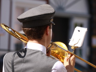 marching muscian with a slide trombone