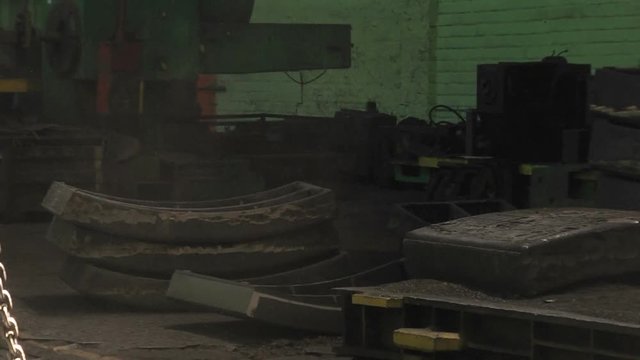 Worker unhooked from the crane beams tubing.
