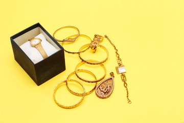 group of muslim woman golden jewelry isolated on yellow background
