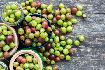 Fresh gooseberries on wooden 