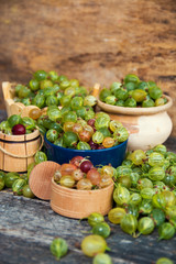 Fresh gooseberries on wooden 