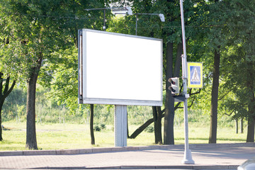 Blank billboard for advertising located in the city. near the road.