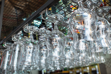 Glass glasses hung from the bar