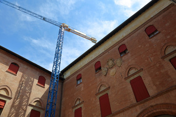 The building and architectural details on the streets of Bologna in Italy
