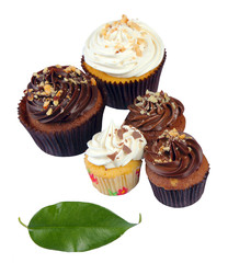 cookies / five cookies in baskets and leaf on a white background