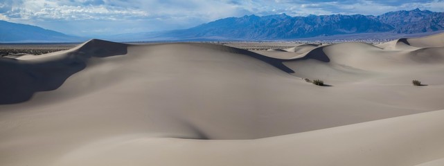 Panoramic view of the pristine smooth sand of the Mesquite Flat Sand Dunes in Death Valley National...