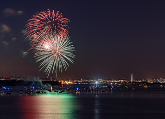Fototapeta premium Fireworks over Potomac River and Washington, DC