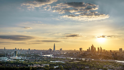 Fototapeta premium London skyline at sunset including Tower Bridge and skyscrapers
