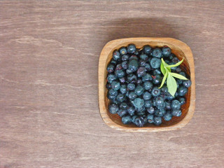 Healthy blueberry on old wooden rustic floor