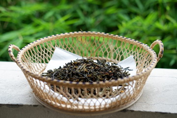 Fototapeta na wymiar hot teapot and tea leaves