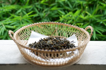 Fototapeta na wymiar hot teapot and tea leaves