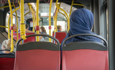 Girl Muslima on bus